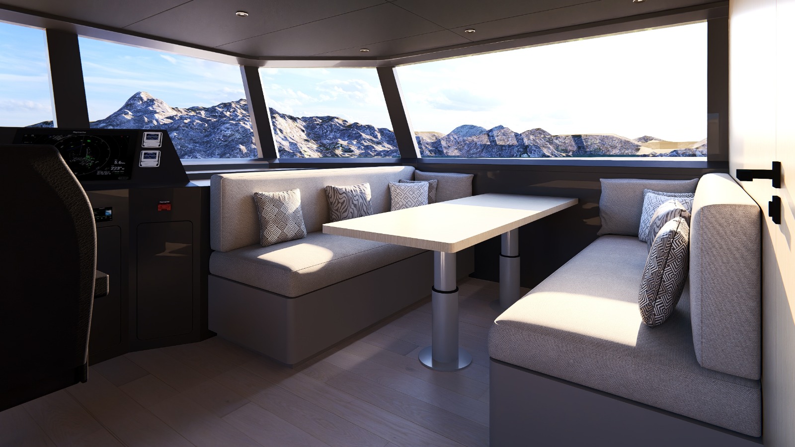 Dining booth beside the helm with mountain views