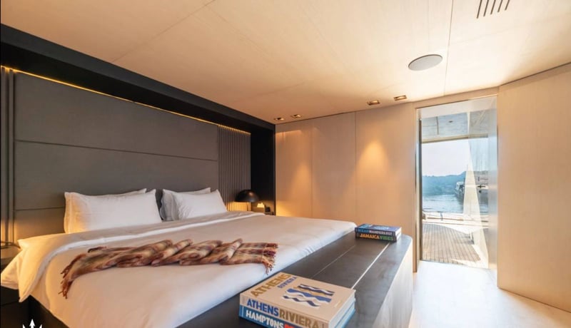 Owner's cabin with king bed and private deck access