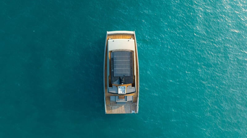 Overhead aerial view of all three decks, flybridge spa and beach deck