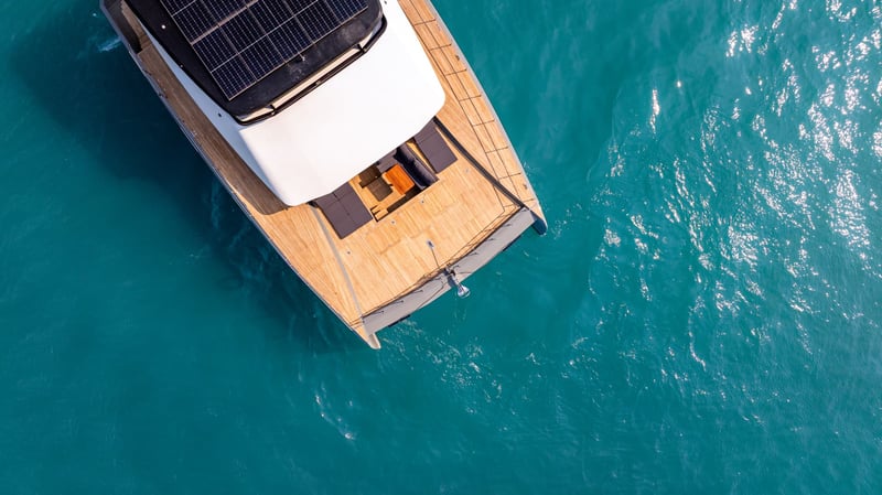 From above: solar roof, teak decks and a bow lounge open to the sea.