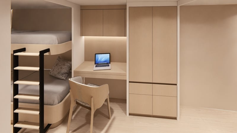 Crew cabin with bunk and desk