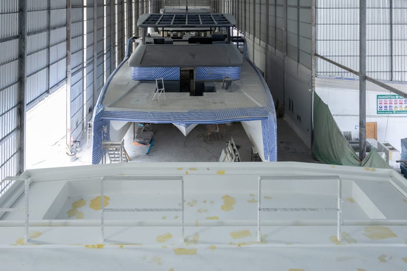 Elevated view of the Independence 110 under construction in the Rayong shed with the solar roof fitted