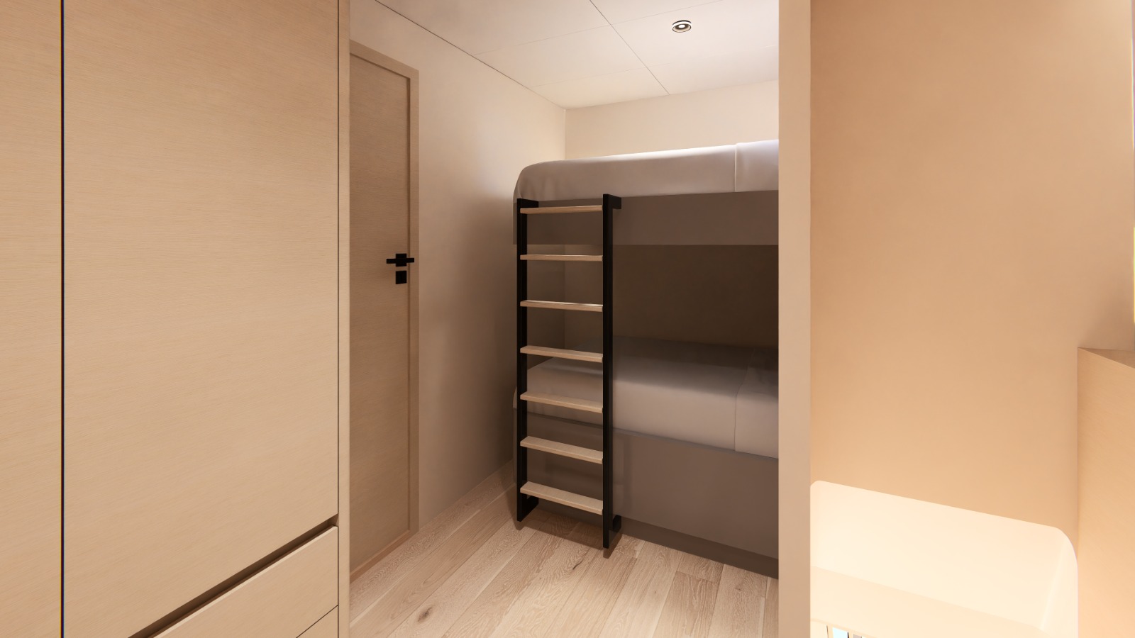 Crew cabin with bunk berths and ladder