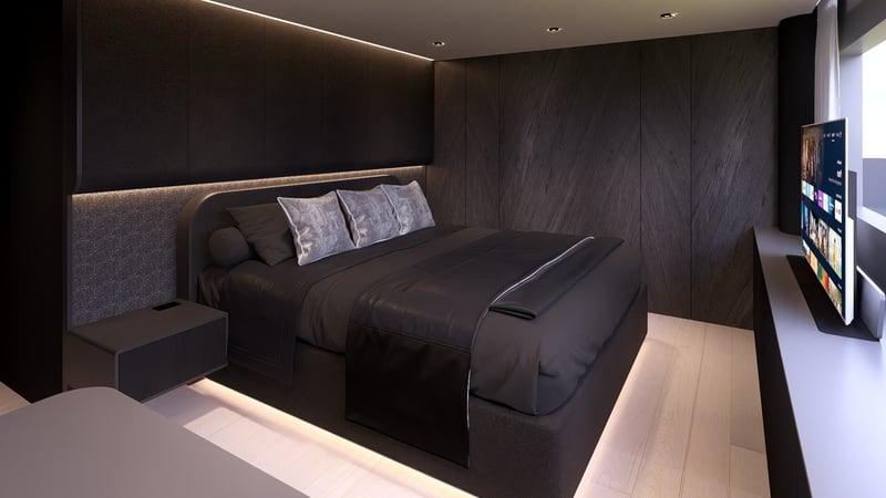 Guest cabin with dark upholstered bed